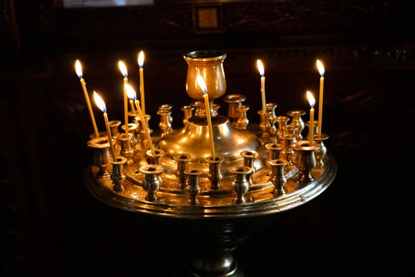 Candles burning over dark background — Stock Photo, Image