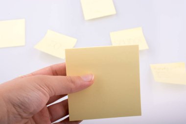 El tutma sarı notepaper 