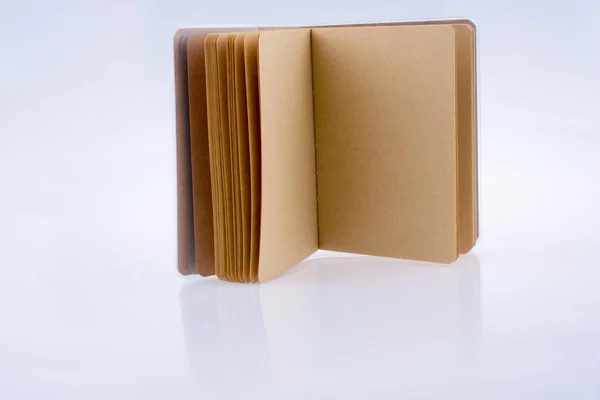 Brown color notebook with open pages — Stock Photo, Image