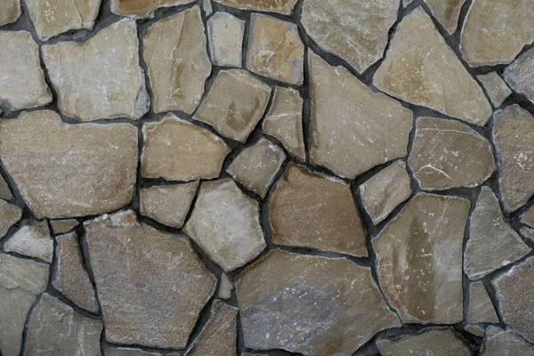 Стіна з одного типу каменів — стокове фото