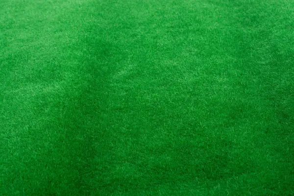 Hierba verde falsa como fondo —  Fotos de Stock