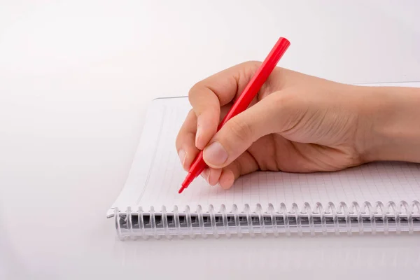 Escribir a mano en un cuaderno — Foto de Stock