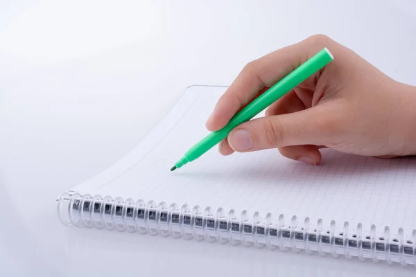 Ręczne pisanie na notatniku — Zdjęcie stockowe