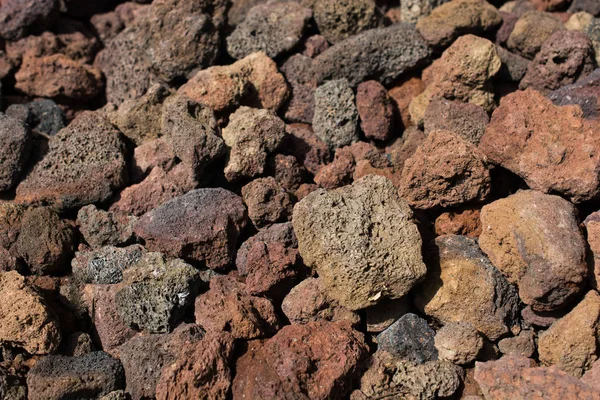 Bakgrund som är fulla av små stenar — Stockfoto