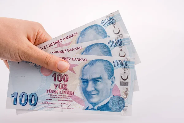 100 банкнот "Туркш Лира" в руке — стоковое фото