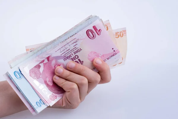 Billetes turksh lira en mano — Foto de Stock
