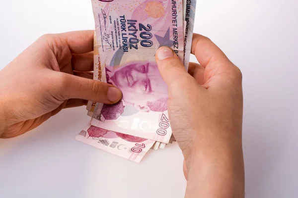 Billetes turksh lira en mano — Foto de Stock