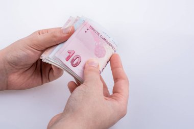 Turksh Lirası banknot elinde tutan el