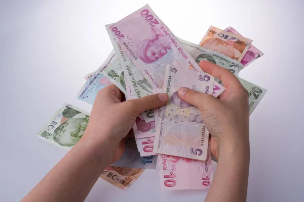Billetes turksh lira en mano — Foto de Stock