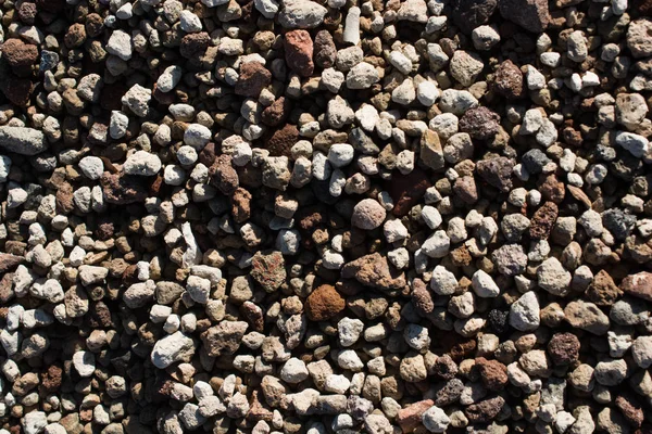 完整的像石头一样的小卵石的背景 — 图库照片