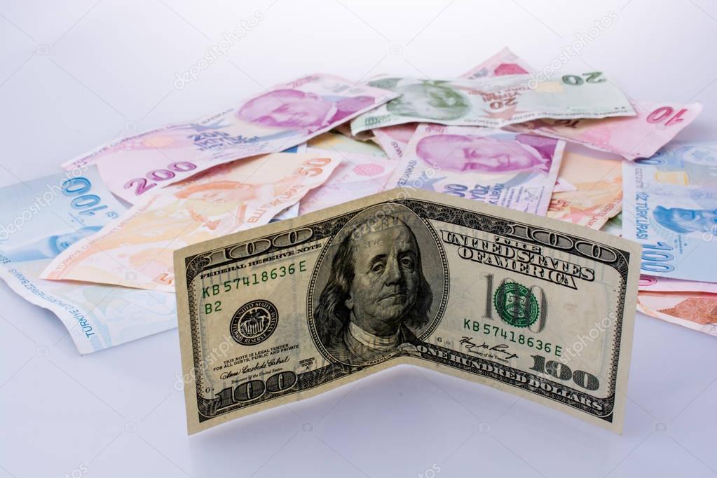 American dollar banknotes and Turksh Lira banknotes side by side