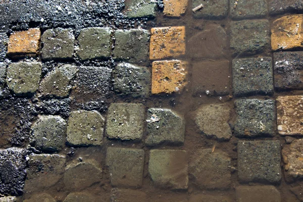Textur Hintergrund des Kopfsteinpflasters gepflasterte Straße — Stockfoto