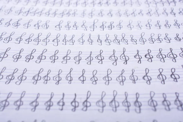Kézzel írott zenei jegyzetek a papíron — Stock Fotó