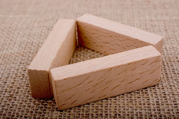 Domino de madera sobre lienzo de lino — Foto de Stock