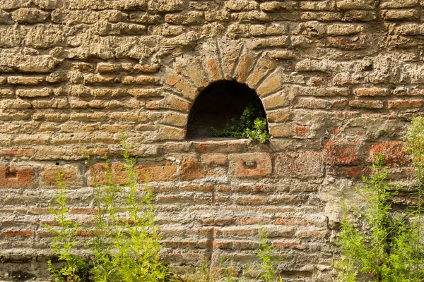 Taş yüzey bir arka plan doku duvar. — Stok fotoğraf