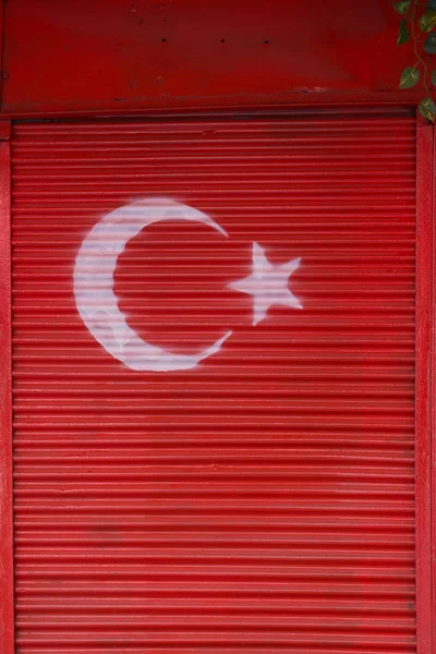 Turkish national  flag painted on metal in the street — Stock Photo, Image