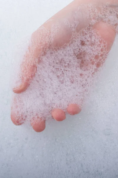 Child washing hands  in foam — Stock Photo, Image