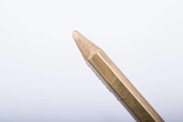 ゴールド カラーの鉛筆を手で押し手 — ストック写真