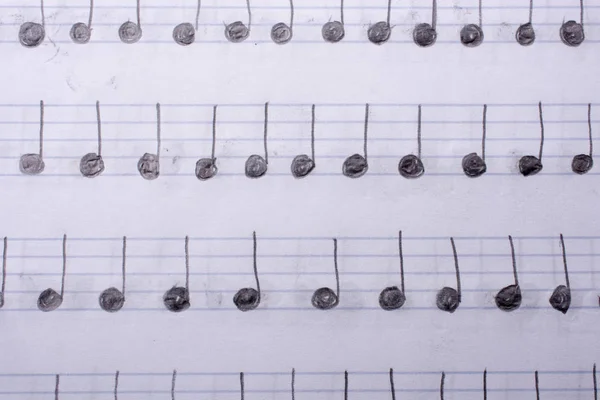 Las notas musicales escritas a mano están en papel — Foto de Stock