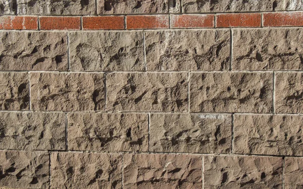 Wall made of the same type of stones — Stock Photo, Image