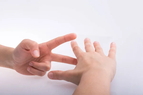 Handen de tekenen rock papier schaar — Stockfoto