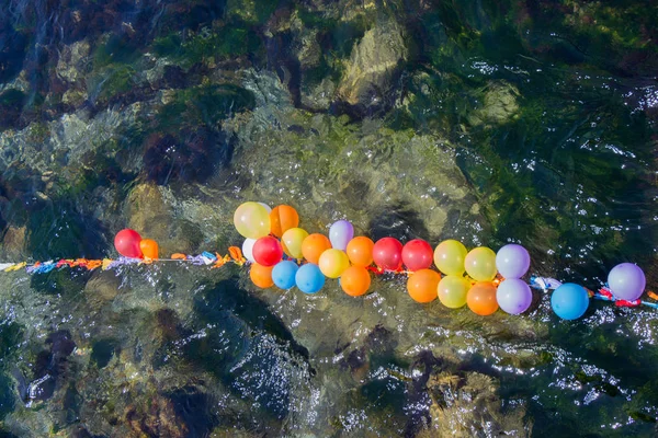 Balloons as targets on water — Stock Photo, Image