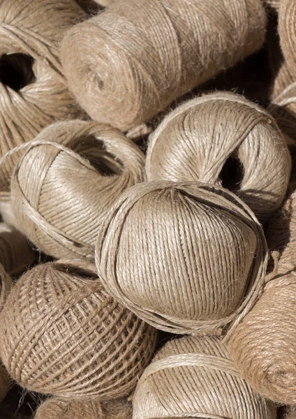 Set of Rolls of brown linen thread