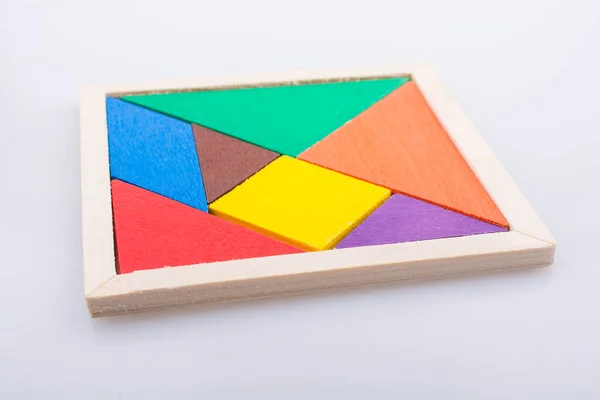 Stukjes van een vierkante tangram puzzel — Stockfoto