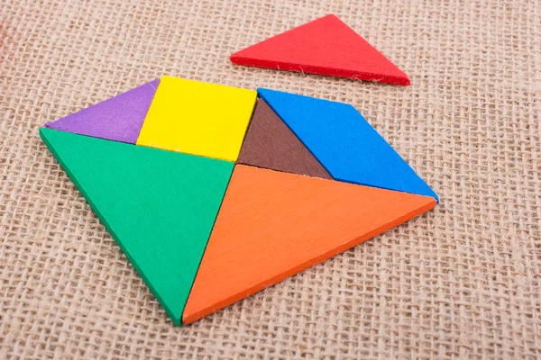 Stukjes van een vierkante tangram puzzel — Stockfoto