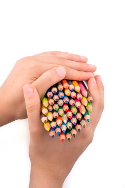 renkli kalemler tutan el