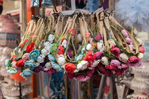 Colorful crowns made of fake flowers — Stock Photo, Image