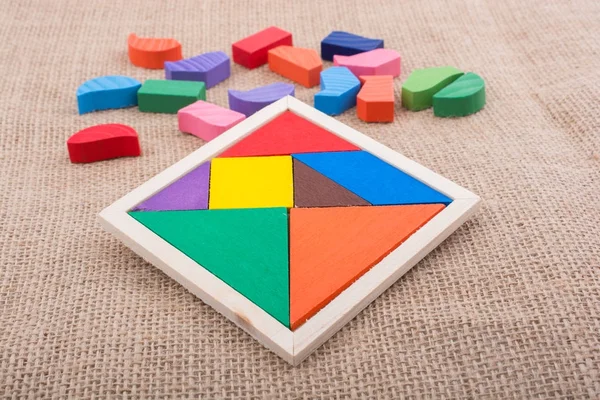 Stukjes van een vierkante tangram puzzel — Stockfoto