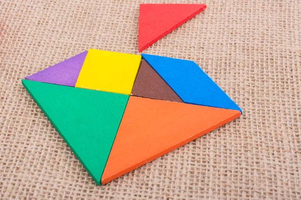 Bir kare tangram bulmacanın parçaları