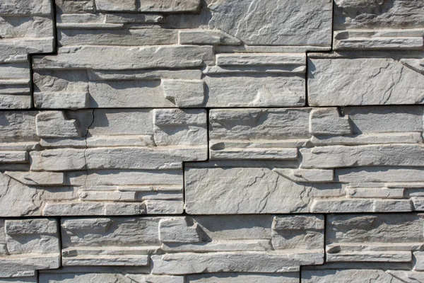 Wall made of the same type of stones — Stock Photo, Image