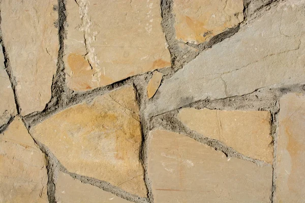 Wall made of the same type of stones — Stock Photo, Image