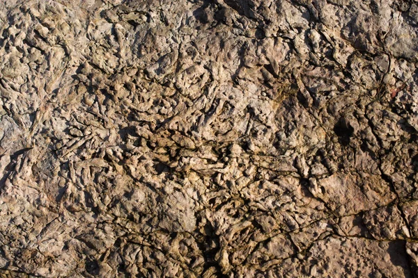 Arka plan dokusu olarak doğal kaya veya taş yüzeyi