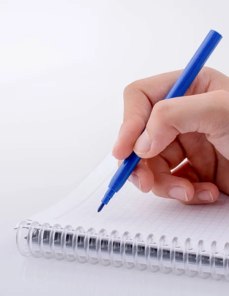 Escrita Mão Caderno Com Uma Caneta Fundo Branco — Fotografia de Stock
