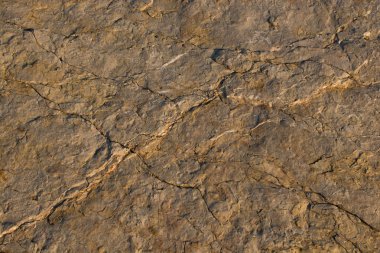Arka plan dokusu olarak doğal kaya veya taş yüzeyi