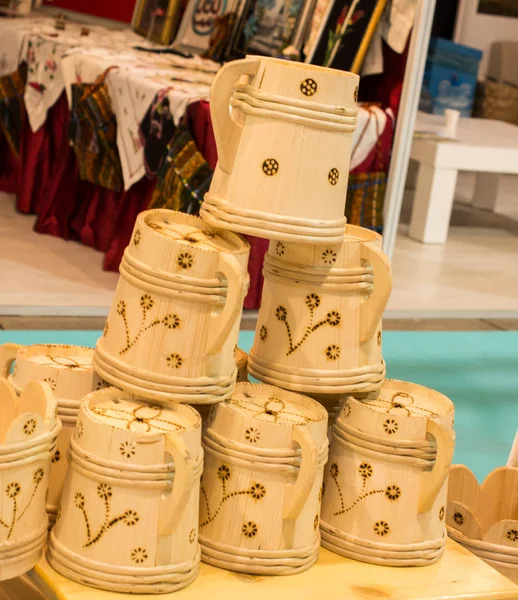 Set of buckets made of wood in a market place