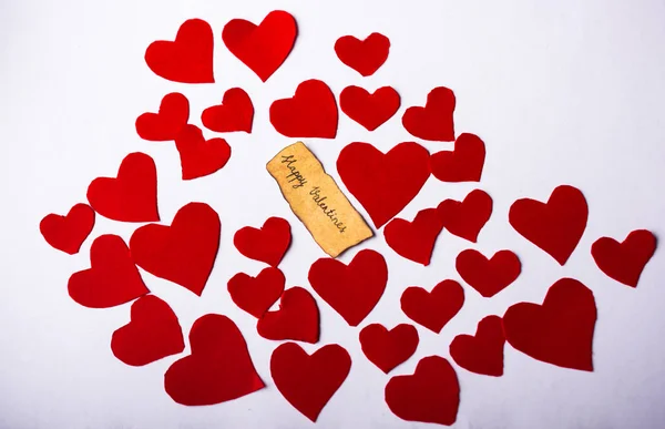 Valentine\'s day wording on torn paper as Love concept