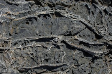 Doğal kaya, arka plan dokusu olarak taş yüzeyi.