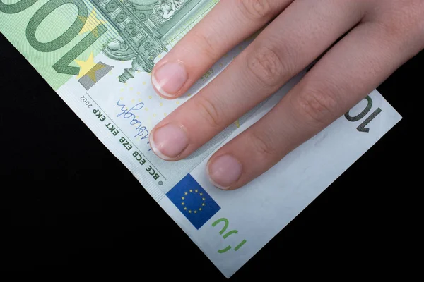 Hand Holding 100 Euro Money Cash Isolated Black Background — Stock Photo, Image