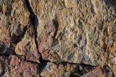 Doğal kaya, arka plan dokusu olarak taş yüzeyi.