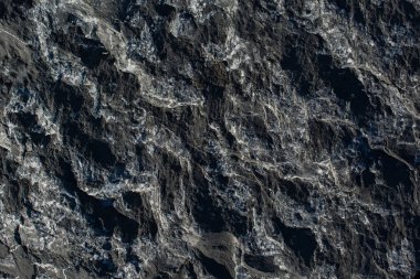 Arka plan dokusu olarak doğal kaya veya taş yüzeyi