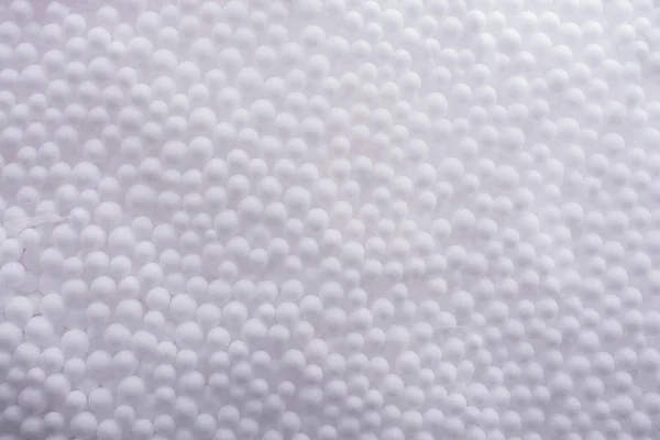 White polystyrene foam balls as background