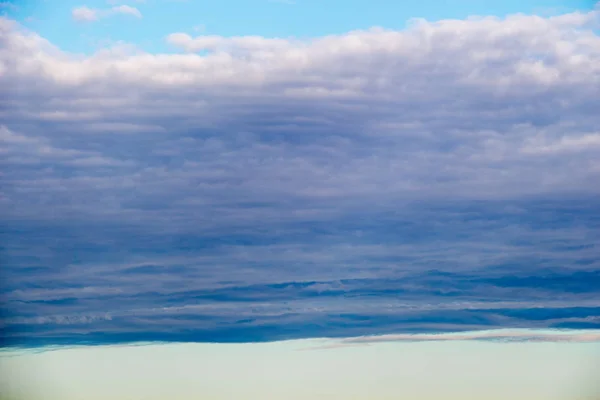 White color clouds found in the  blue sky