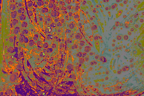 Макросъемка воздушных пузырьков на цветном фоне — стоковое фото