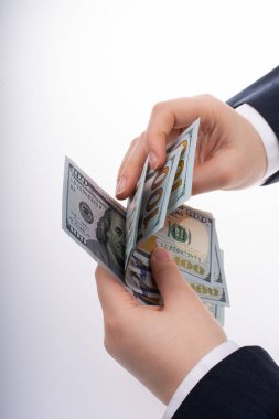 Bizi Doları banknot para tutan işadamı