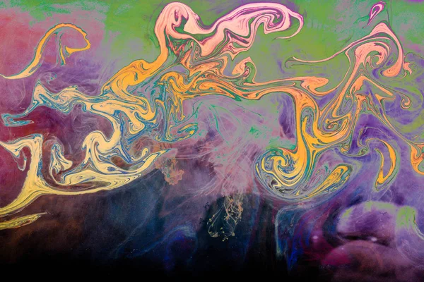 Tinta dissolver rodopiar em água formando fundo colorido — Fotografia de Stock