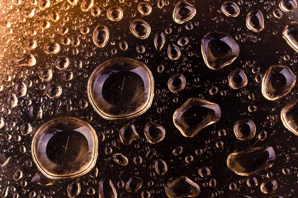 Fundo coberto com gotas de água em close-up — Fotografia de Stock